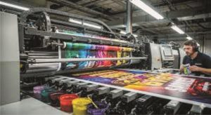 Wide-format printing machine producing large-scale marketing materials